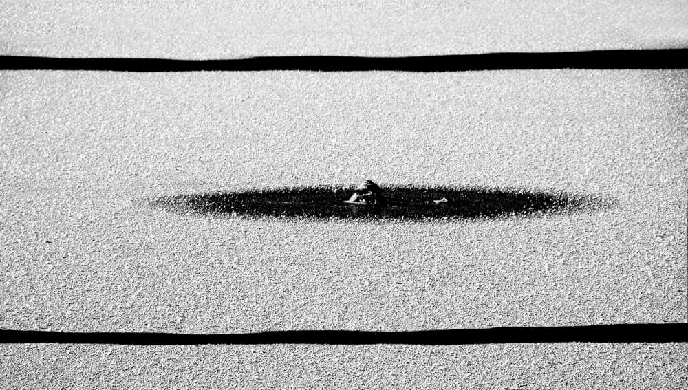 Dark Hole In Frozen Ice by Jacek Stefan — canvas wall art