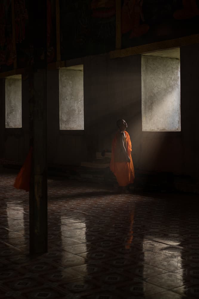 Monk In Temple Light by Wave Faber — canvas wall art