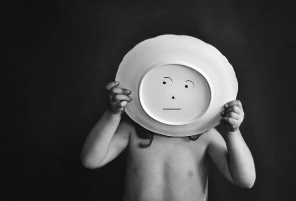 Child Holding Drawn Face by Monique — canvas wall art