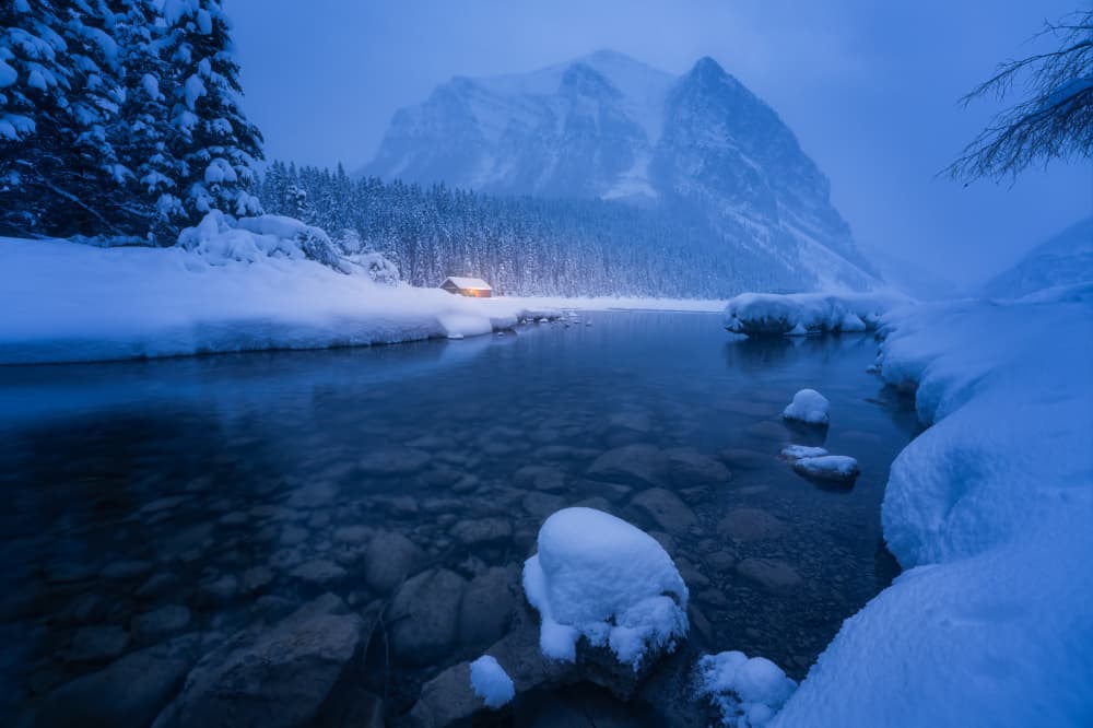 Cozy Winter Lake Cabin by Yongnan Li (李永男) — canvas wall art