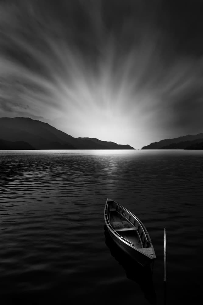 Solitary Boat Dawn by Jassi Oberai — canvas wall art