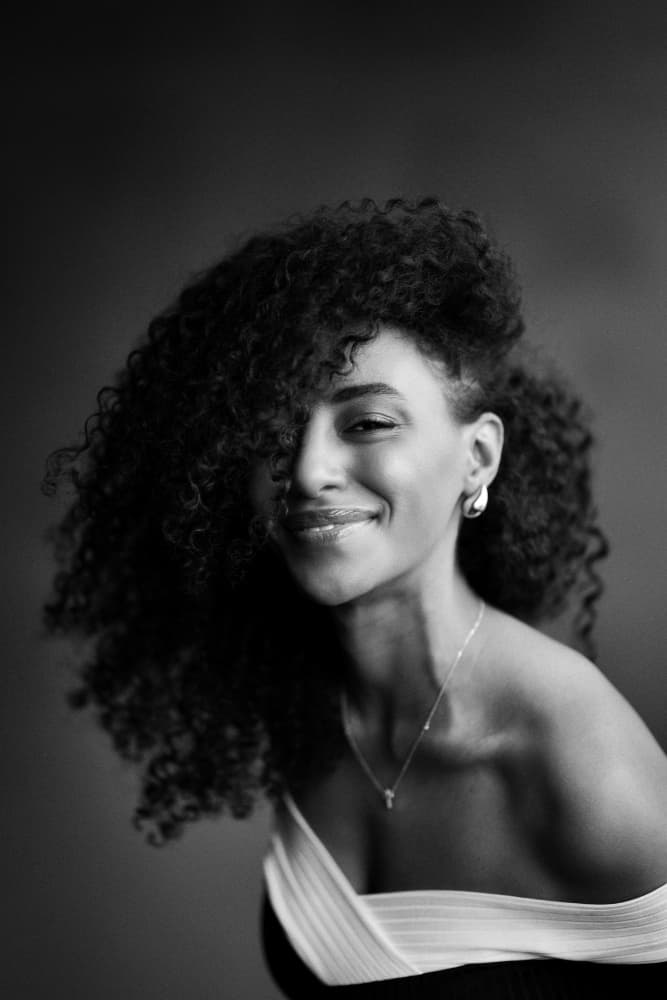 Smiling Confident Woman by Patrick Wöhrle — canvas wall art