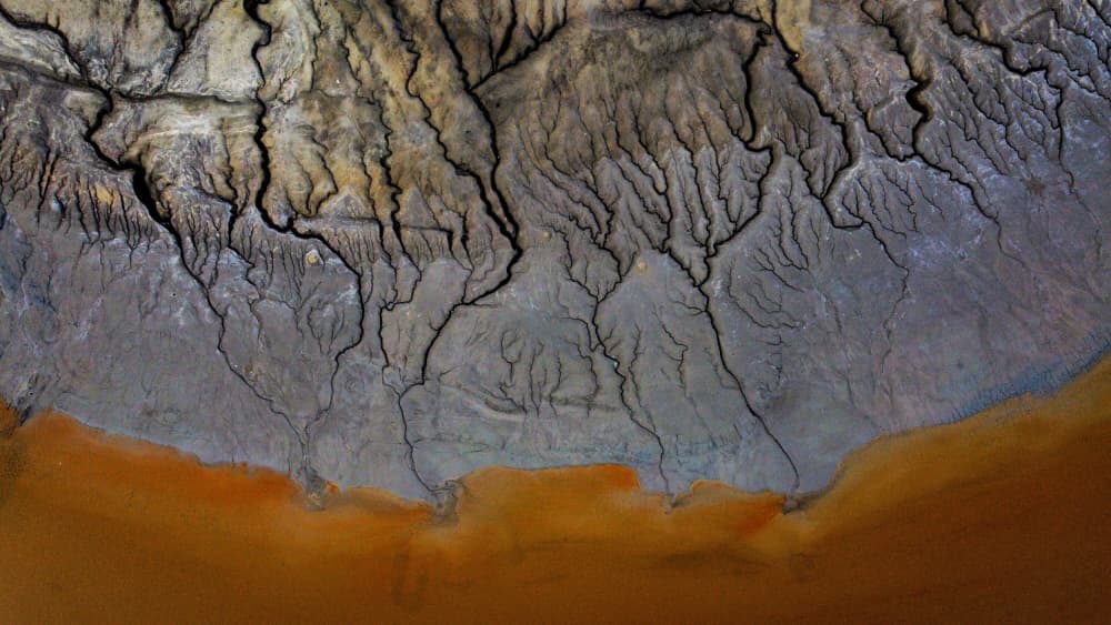 Eroded Orange Delta by Saeed Keramati — canvas wall art