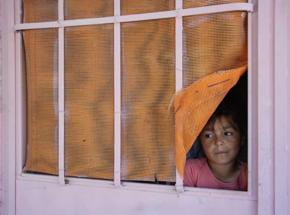 Girl Peeking Window by Fatma GÖKMEN — canvas wall art
