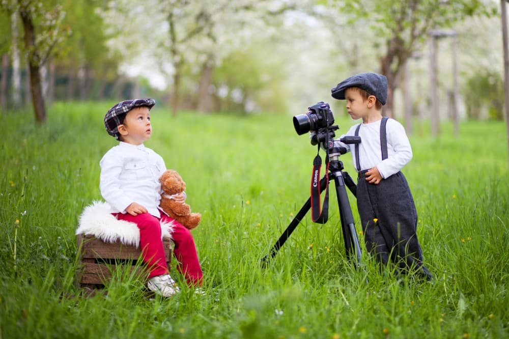 Little Photographers In Spring by Tatyana Tomsickova — canvas wall art