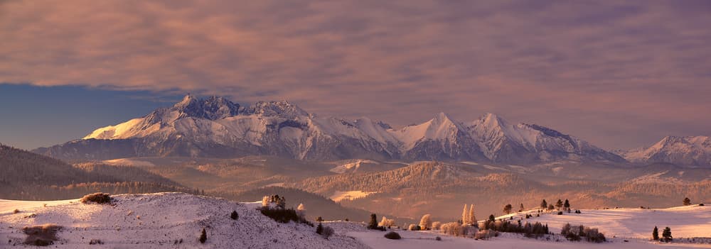 Winter Mountain Glow by Krzysztof Mierzejewski — canvas wall art