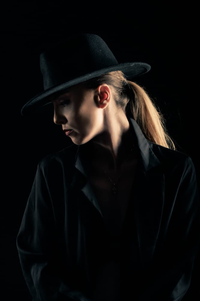 Elegant Woman in Hat by Sharon Levy — canvas wall art