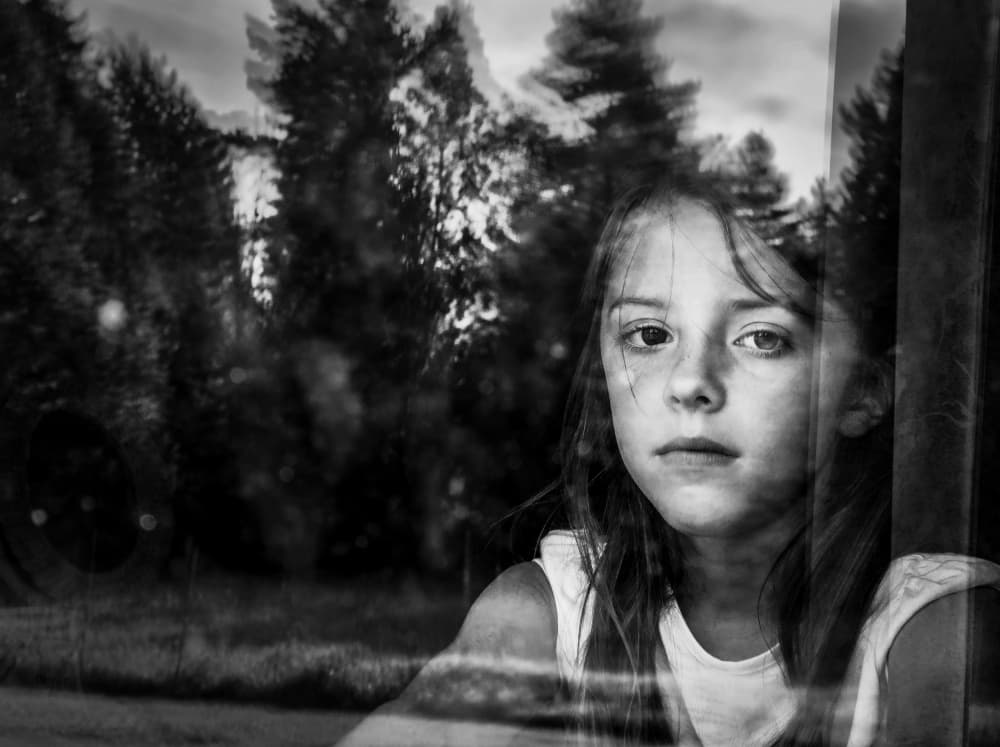 Young Girl Window Reflection by Delphine Margau — canvas wall art