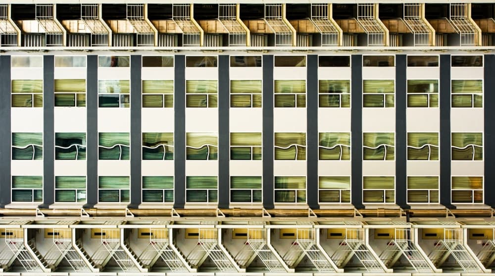 Geometric Building Symmetry by Wayne Pearson — canvas wall art