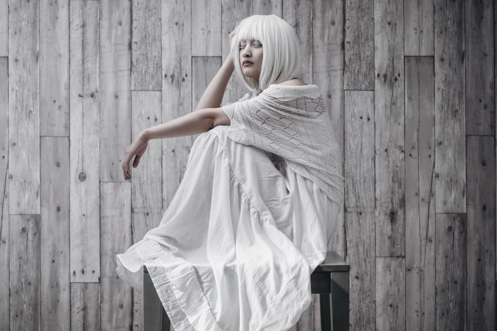 Pensive Woman Rustic Setting by Suzuhiko Suzuki — canvas wall art
