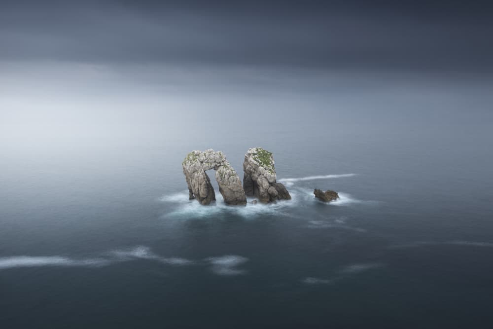 Serene Misty Ocean Rocks by Sergio Saavedra Ruiz — canvas wall art