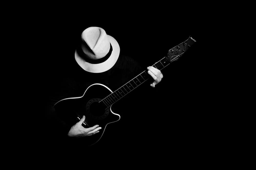 Shadowy Guitar Player by Joško Šimic — canvas wall art