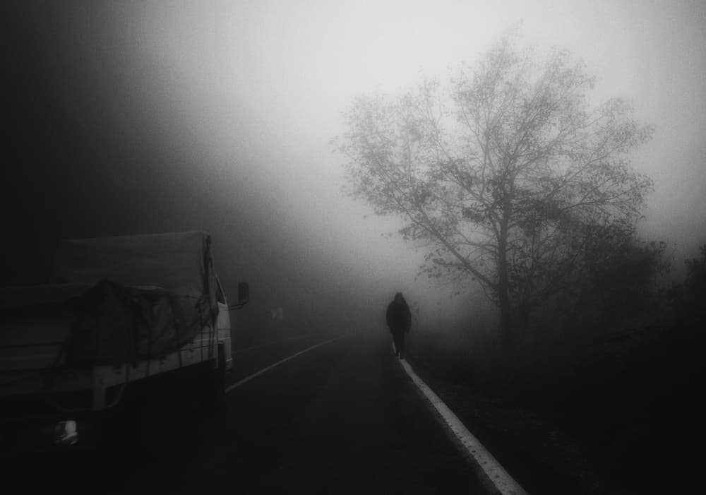 Lone Figure Foggy Road by Ali Ayer — canvas wall art