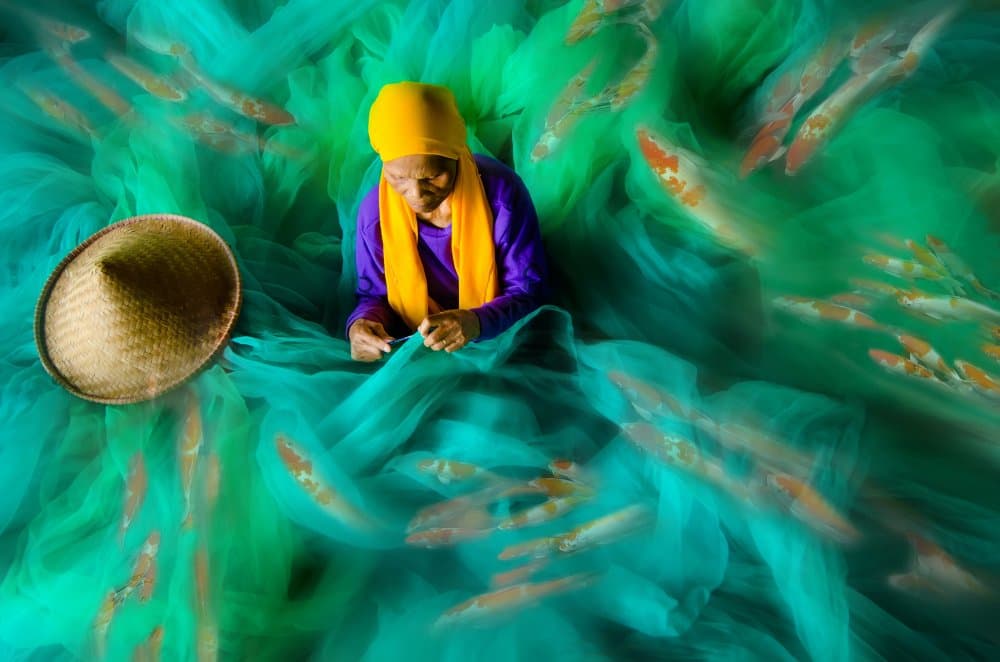 A Woman's Fishing Net by Rawisyah Aditya — canvas wall art