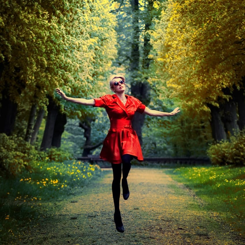 Joyful Woman Red Dress by ambra — canvas wall art