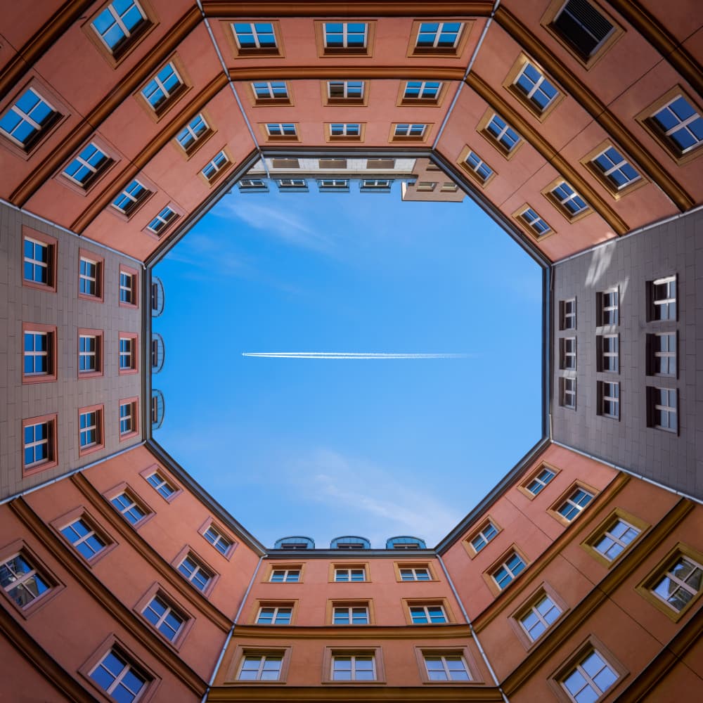 Looking Up City Sky by Nadav Jonas — canvas wall art