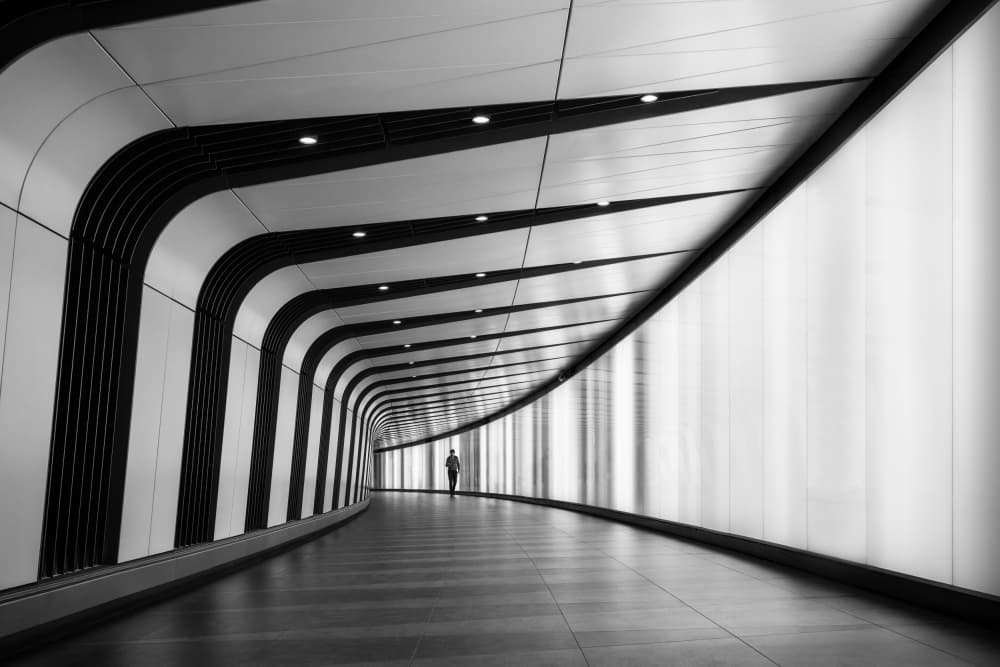 Lone Figure Curved Passage by Marc van Oostrum — canvas wall art