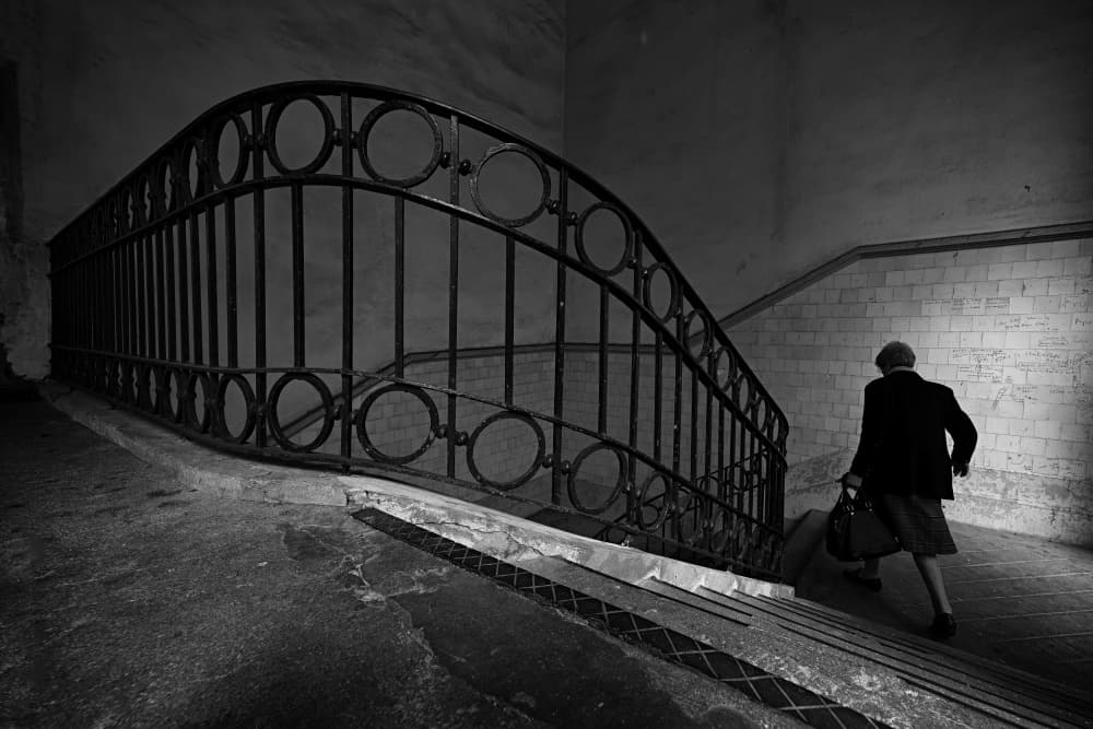 Solitary Stairwell Ascent by Carlos Costa — canvas wall art
