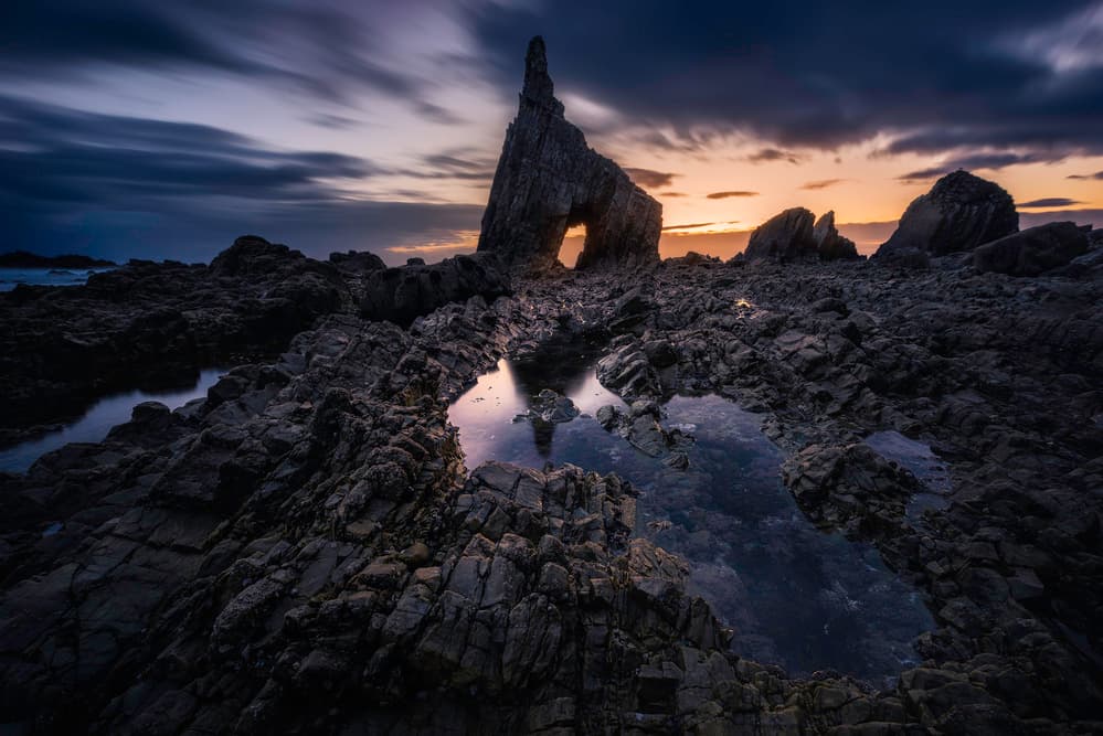 Coastal Arch Sunset by Jorge Ruiz Dueso — canvas wall art
