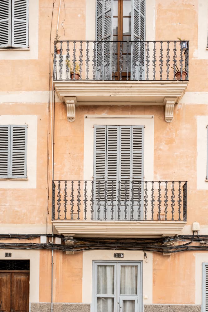 Quaint Peach Balconies by Henrike Schenk — canvas wall art