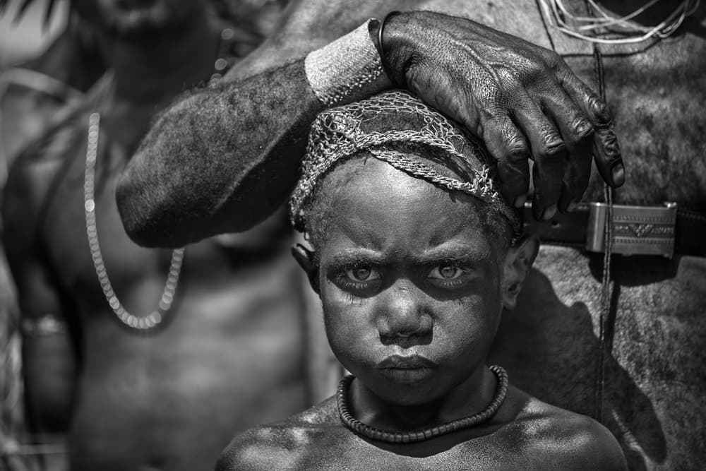Intense Child Gaze by Gunarto Song — canvas wall art