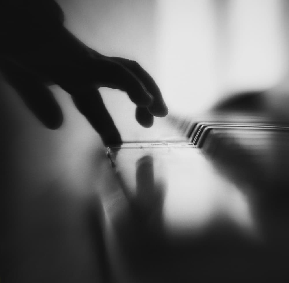 Playing Piano Keys by Despird Zhang — canvas wall art