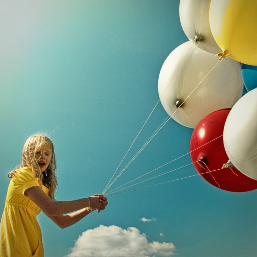 Joyful Girl With Balloons by ambra — canvas wall art