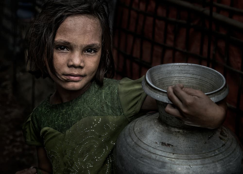 Young Girl Carrying Water by Joxe Inazio Kuesta Garmendia — canvas wall art