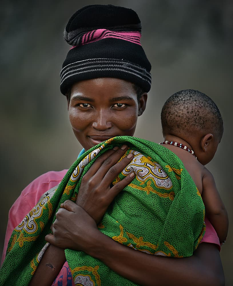 Mother Child Tender Gaze by Irene Perovich — canvas wall art