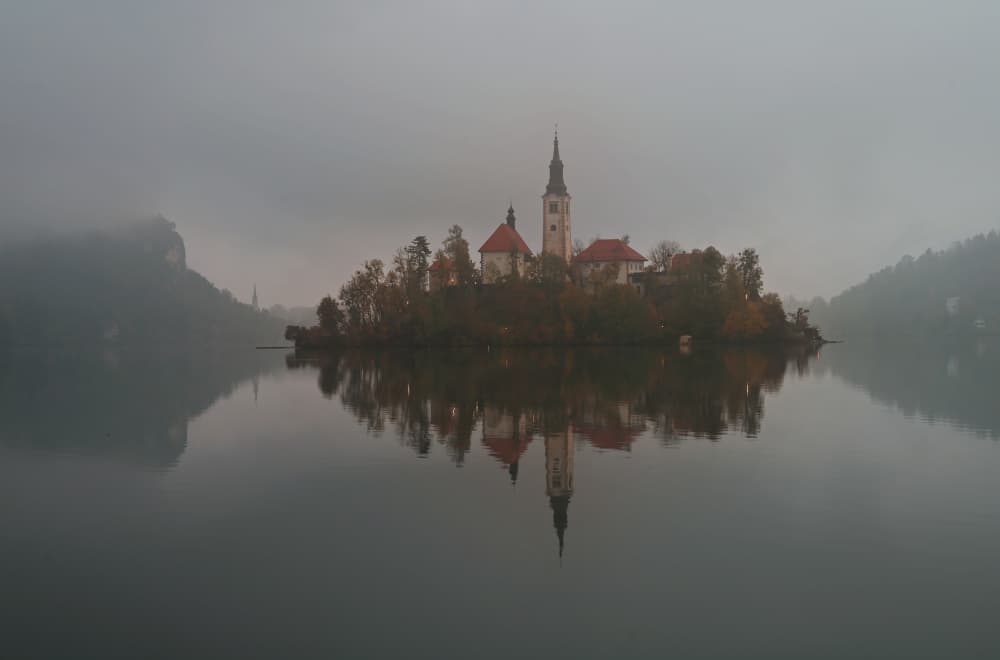 Misty Lake Bled Reflection by Drago Vogrinec — canvas wall art