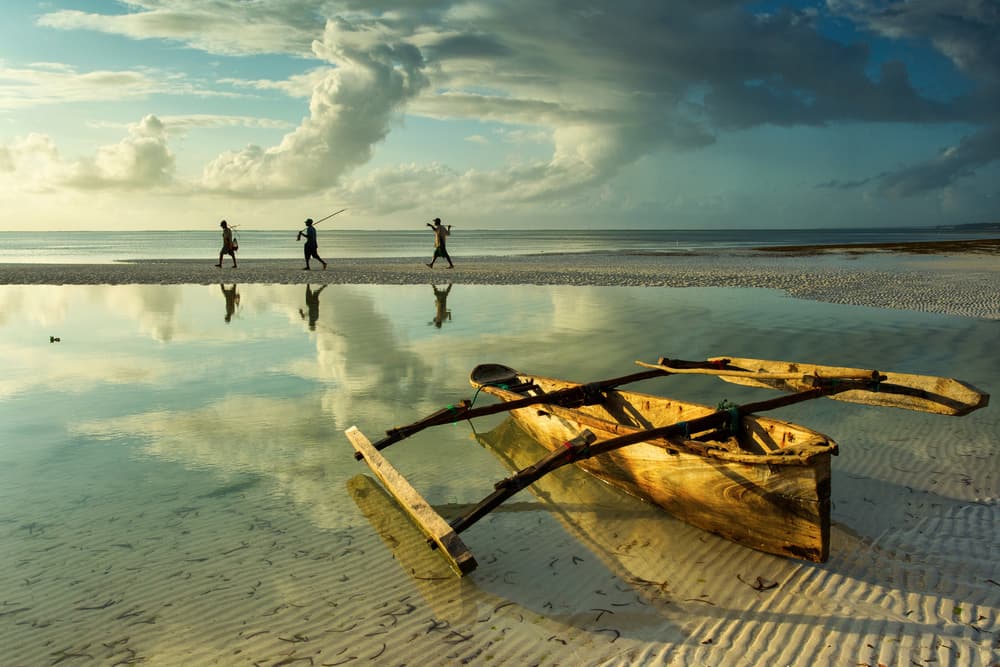Outrigger Boat Reflections by Dan Mirica — canvas wall art