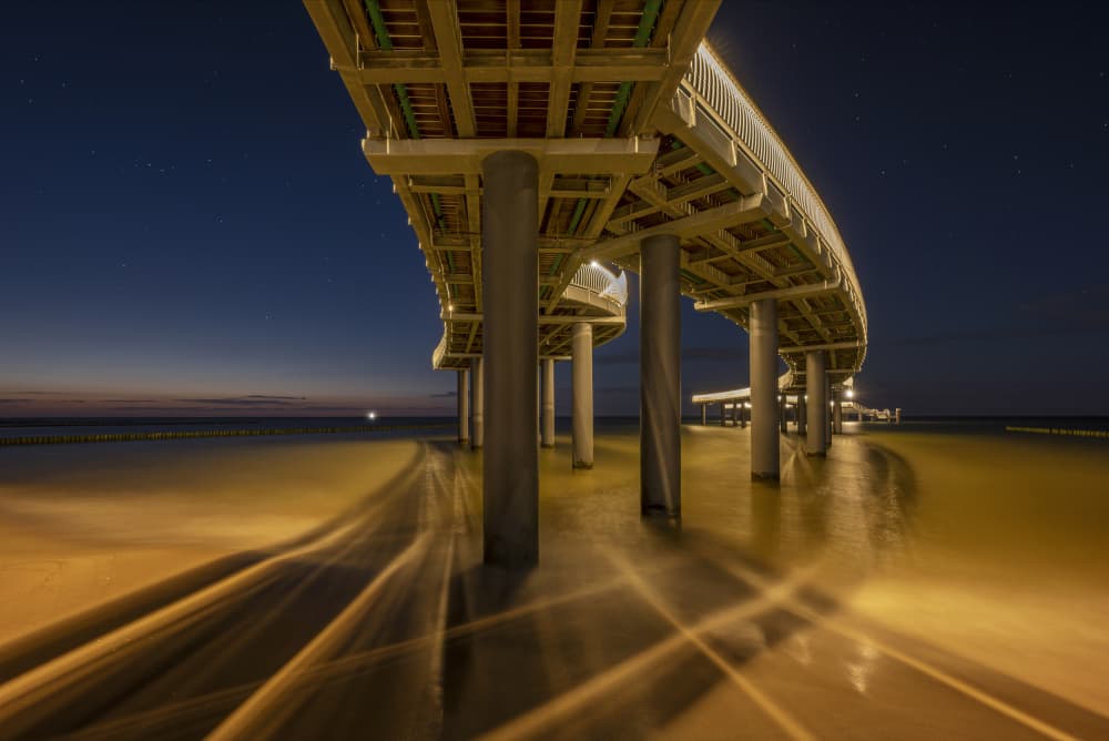 Illuminated Night Pier by fotomarion — canvas wall art