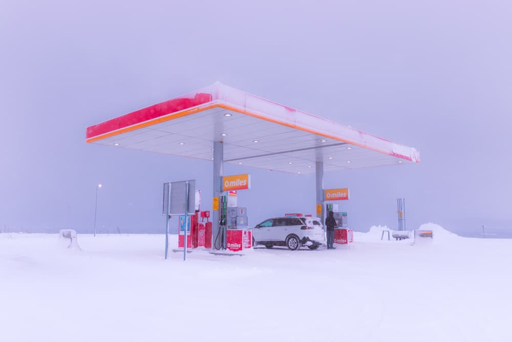Snowy Roadside Refuel by Stephanie Kleimann — canvas wall art