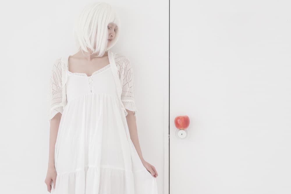 White Dress Red Apple by Suzuhiko Suzuki — canvas wall art