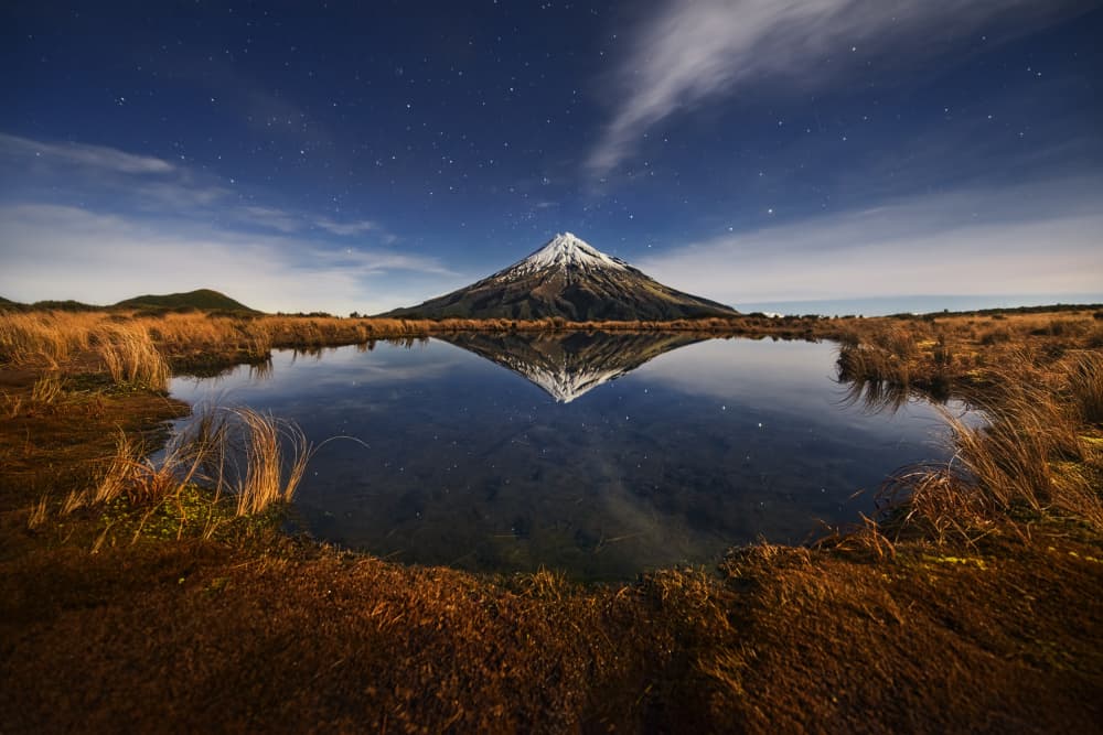 Starry Mountain Lake Reflection by Yan Zhang — canvas wall art
