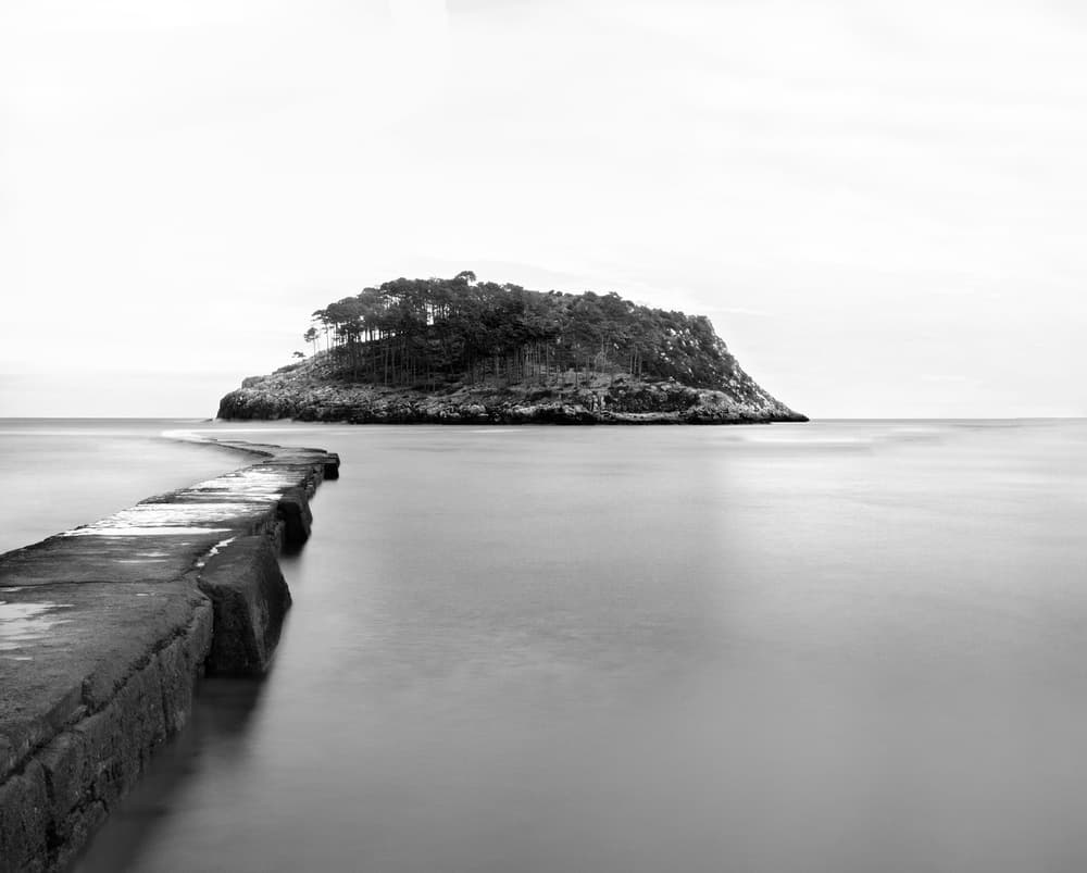 Serene Pier Island View by Mikel Lastra — canvas wall art
