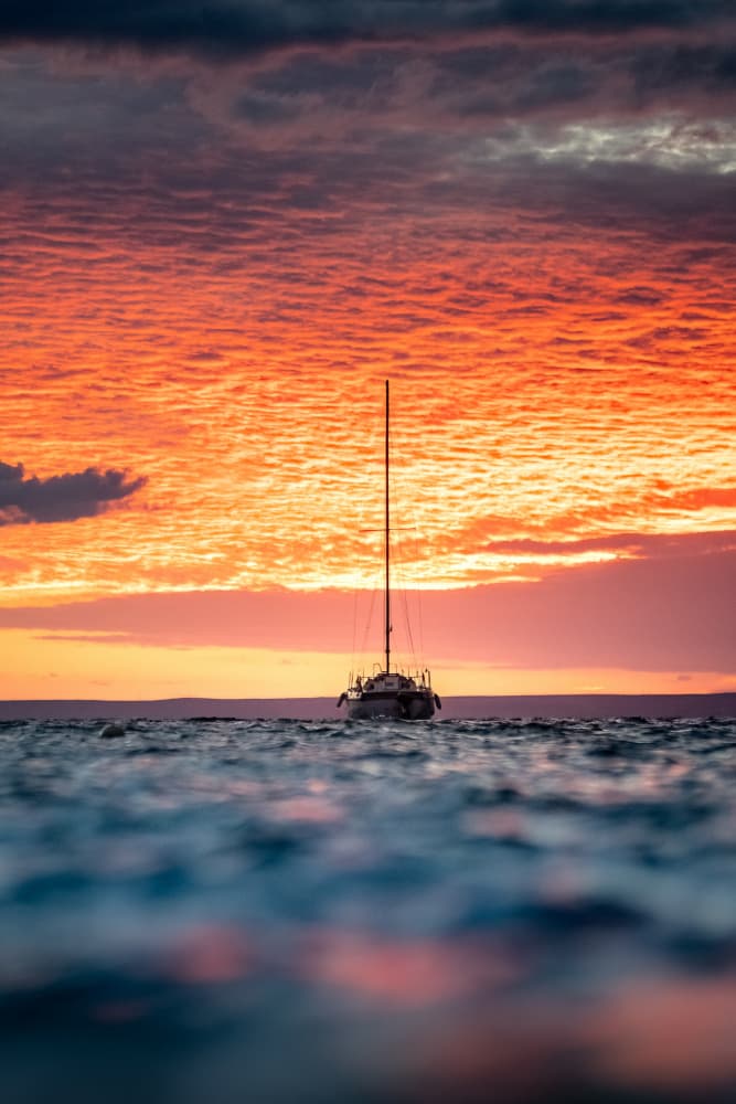 Dramatic Sunset Sailboat by Petar Lupic — canvas wall art