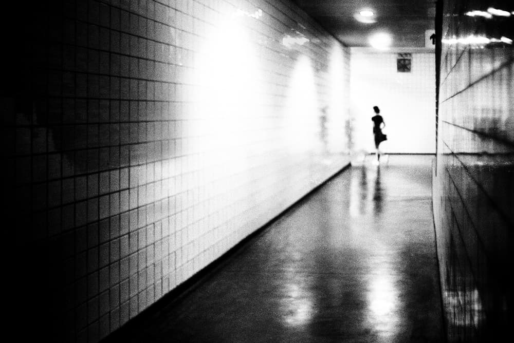 Solitary Hallway Figure by Paulo Abrantes — canvas wall art