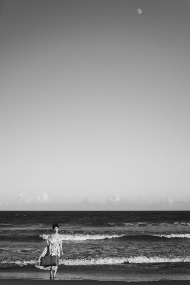 Woman's Quiet Beach Journey by Hiro Fukuda — canvas wall art