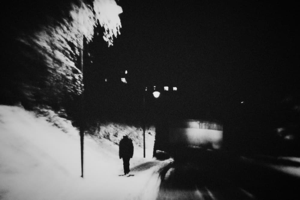 Lone Figure Winter Night by Elena Raceala — canvas wall art