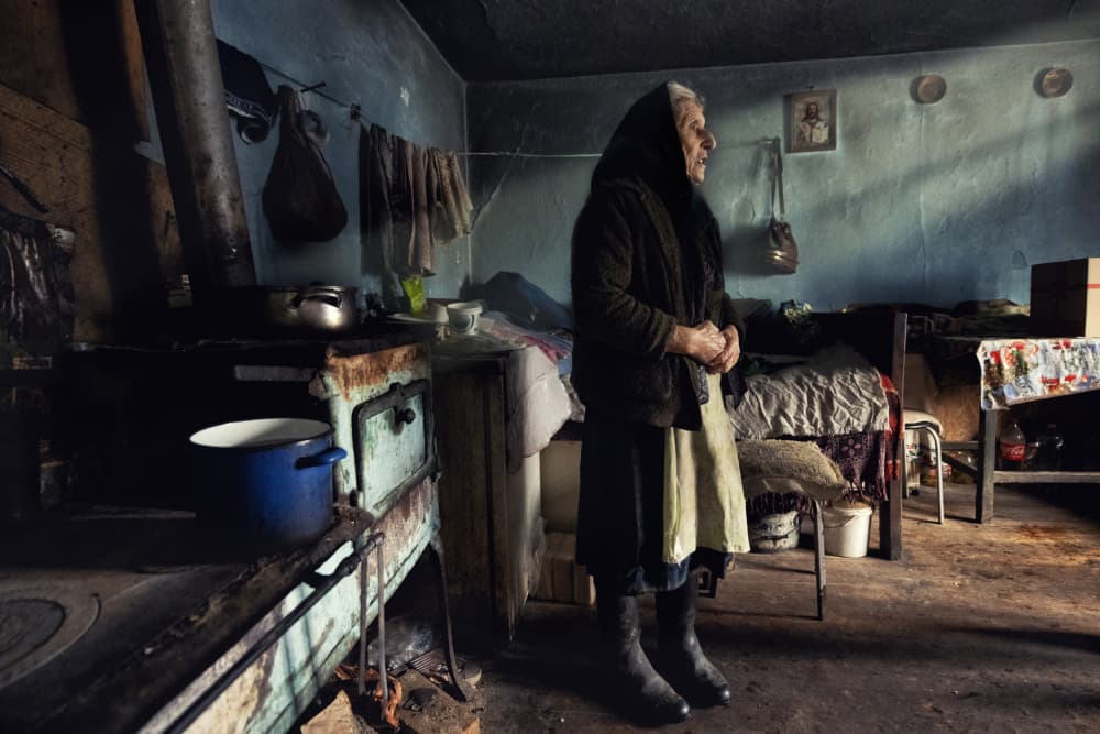 Elderly Woman Rustic Kitchen by Grigore Roibu — canvas wall art