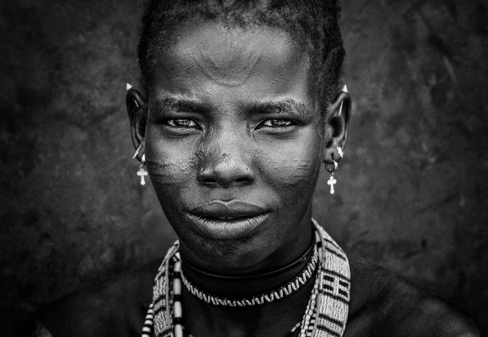 African Tribal Portrait by Joxe Inazio Kuesta Garmendia — canvas wall art