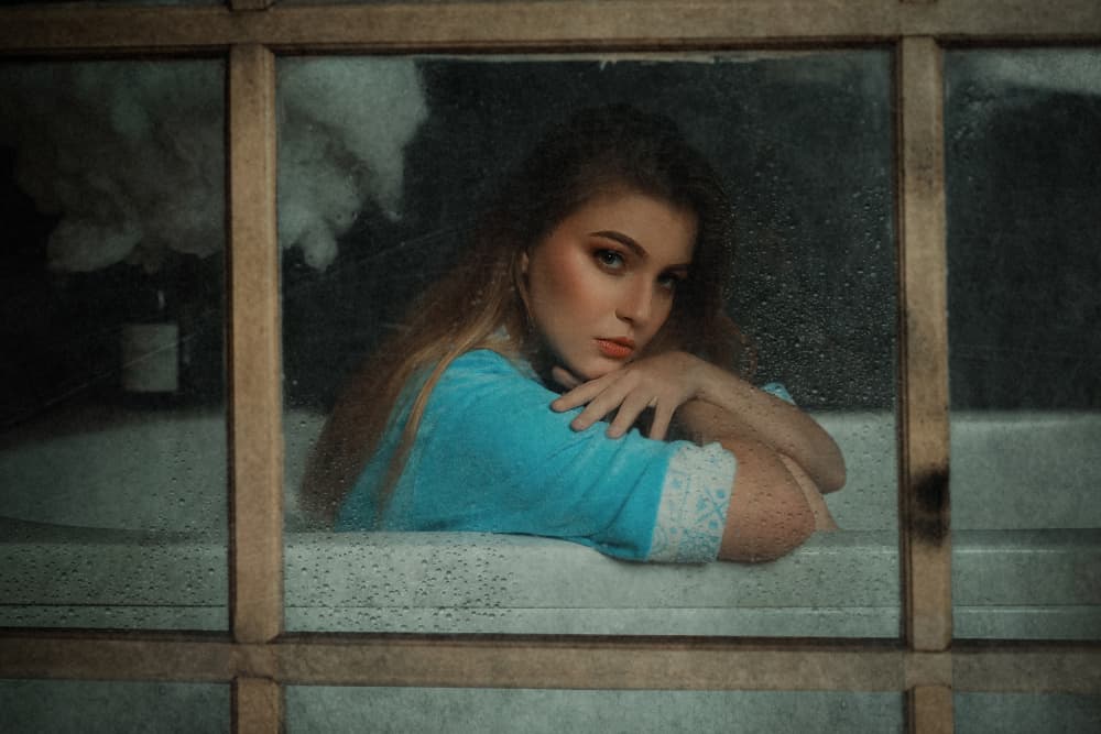 Thoughtful Girl Rainy Window by Djayent Abdillah — canvas wall art