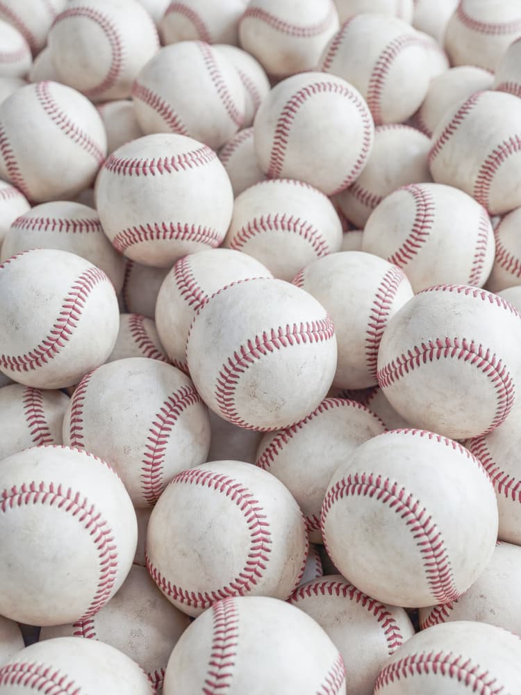 Red Stitched Baseballs by Andreas Magnusson — canvas wall art