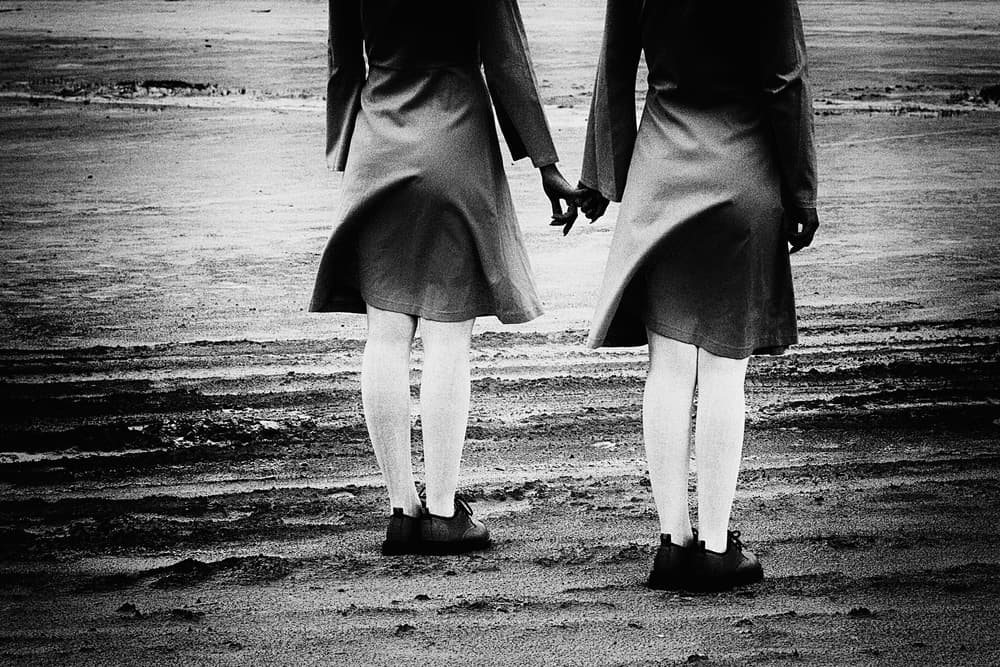 Two Women Holding Hands by Bogdan Bouşcă — canvas wall art
