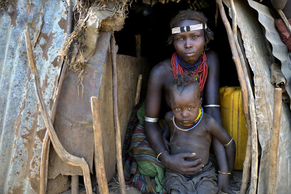 African Mother and Child by Giuseppe DAmico — canvas wall art