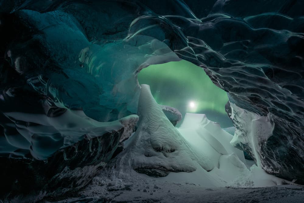Northern Lights Ice Cave by David Martin Castan — canvas wall art
