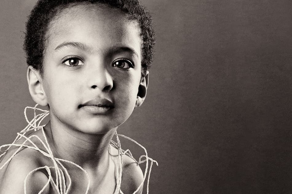 Young Boy Tangled String by Hesham Alhumaid — canvas wall art