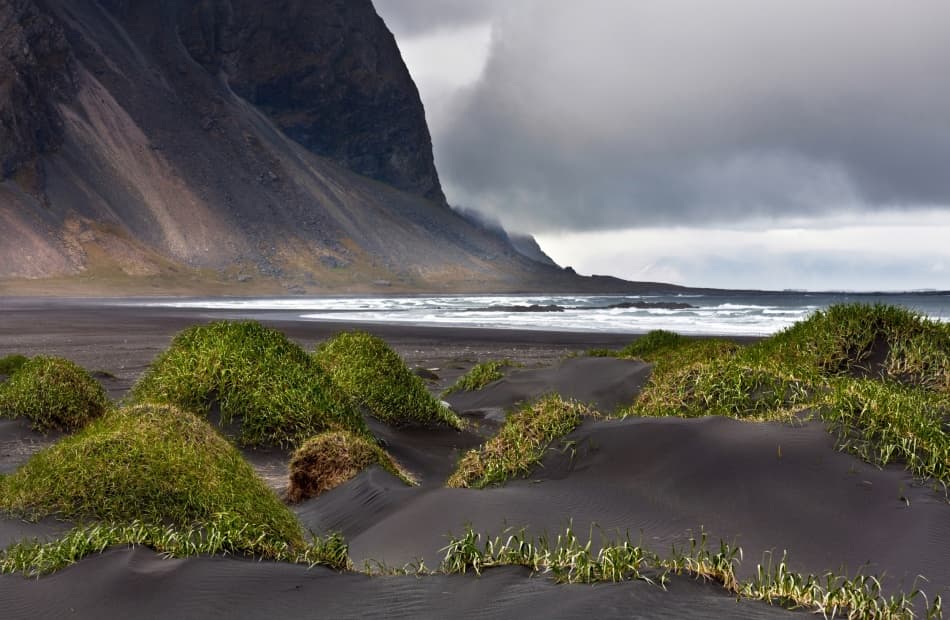 Stormy Black Sand Coast by Reggy — canvas wall art