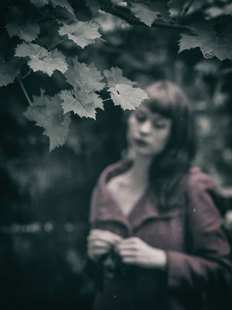 Pensive Girl In Leaves by Jacob Tuinenga — canvas wall art